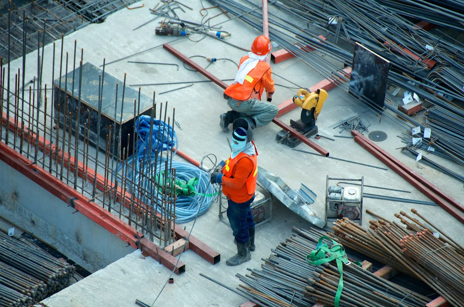 Safety professionals reviewing OSHA training on a tablet